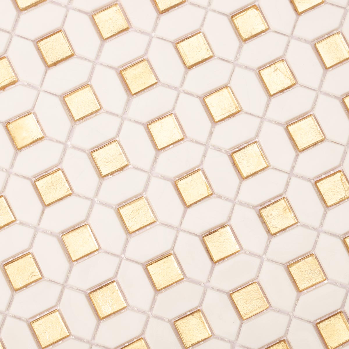 Close-up of glossy gold and white glass mosaic tiles