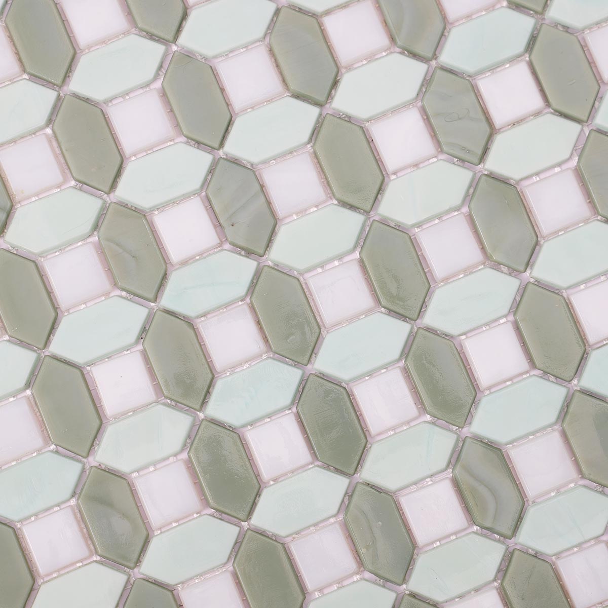 Close-up view of white and coastal green picket glass mosaic tile