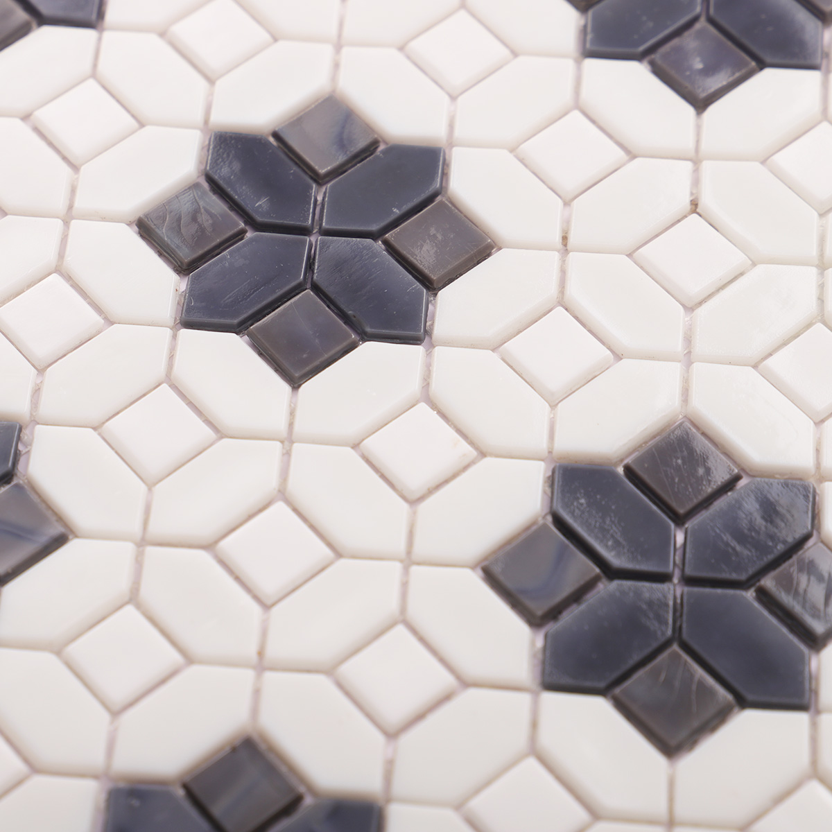 Close-up of gray and white glass picket mosaic tiles
