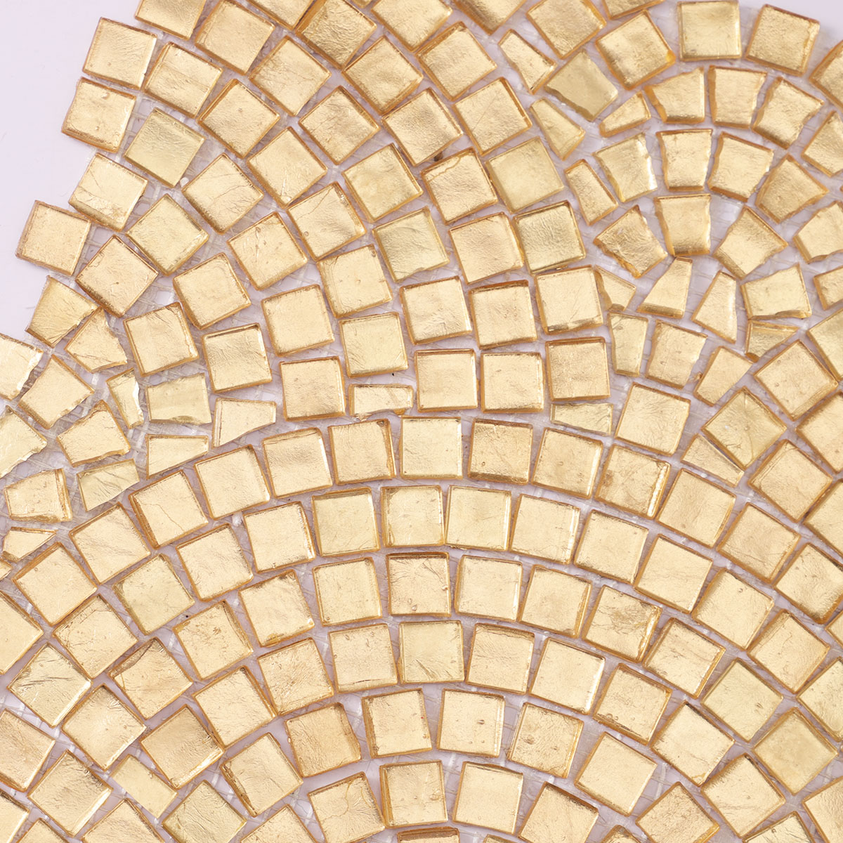 Close-up view of gold glass mosaic art designs