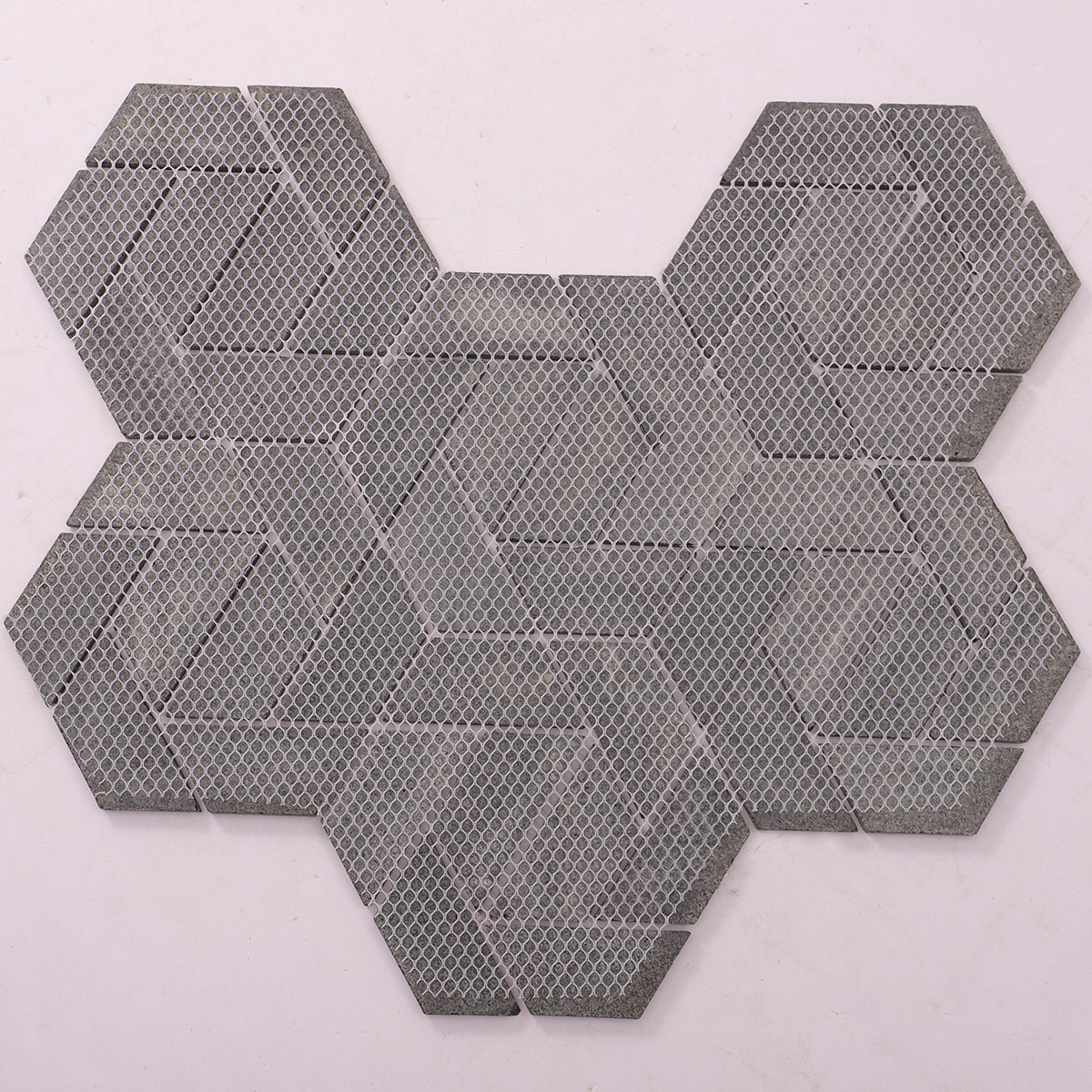 Back view of folded black marble mosaic bathroom floor tiles