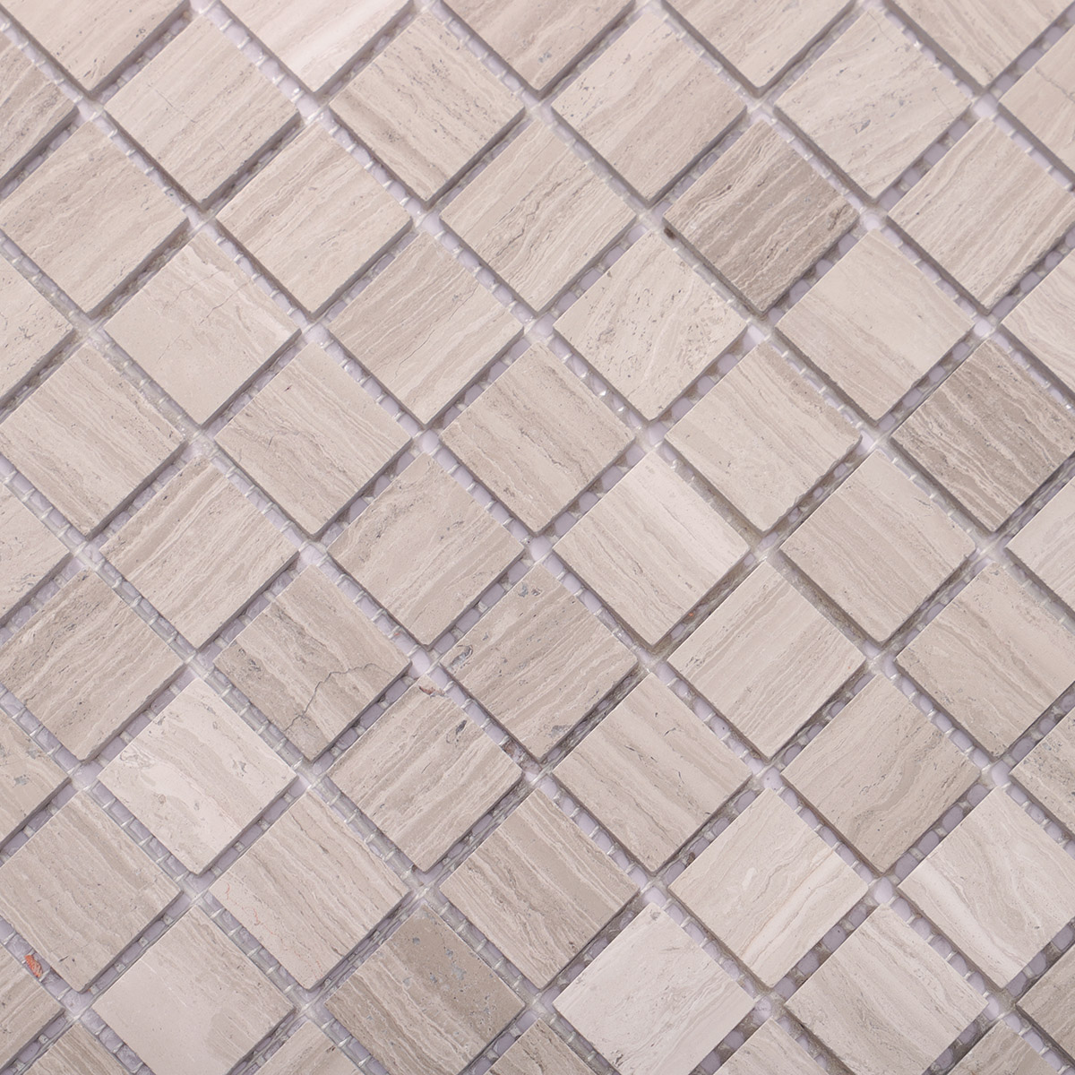 Close-up view of Grigio Legno square marble mosaic tiles.