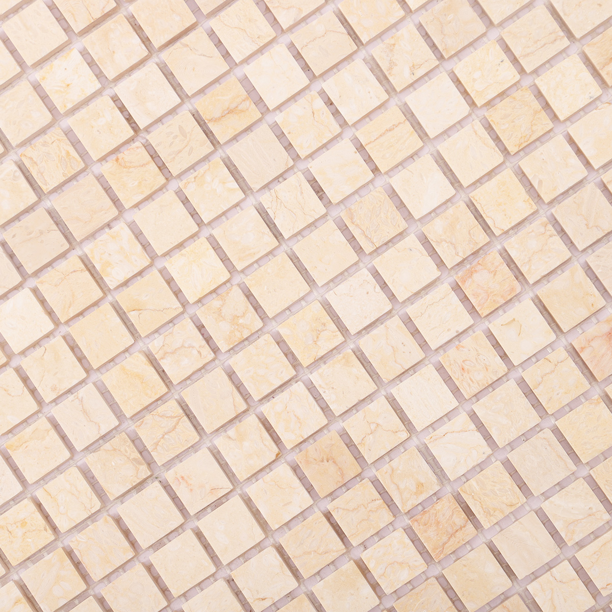 Detailed close-up of Crema Marfil polished marble mosaic tiles.