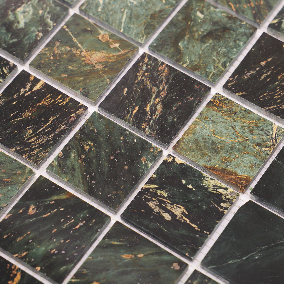 Detailed close-up of Empress Green square marble mosaic tiles.