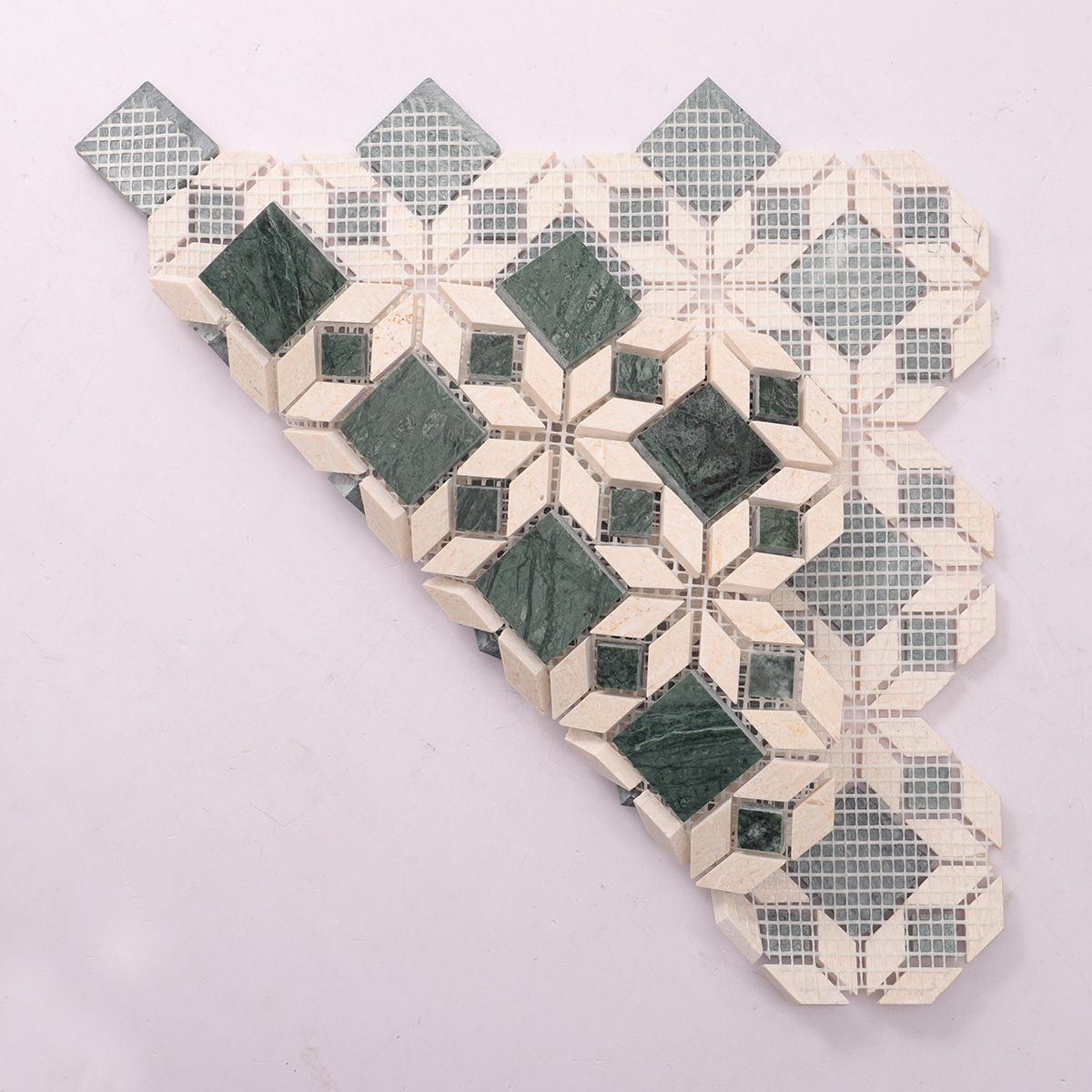 Folded back side of green mixed beige marble mosaic natural stone tiles.