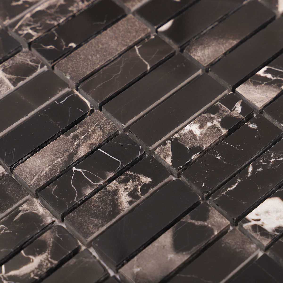 Close-up view of Nero Marquina black polished marble mosaic tile