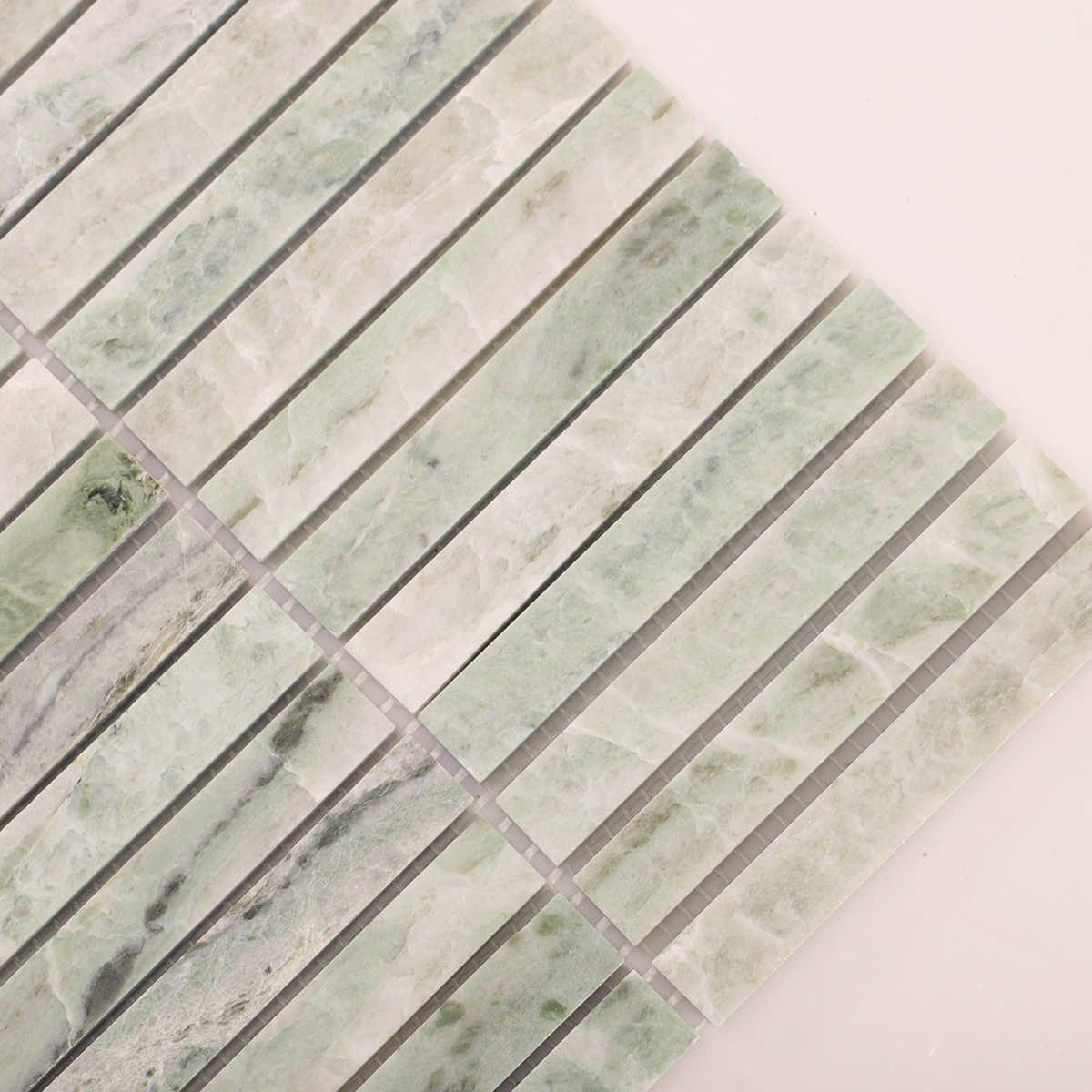 Close-up of Ming green marble polished mosaic tiles