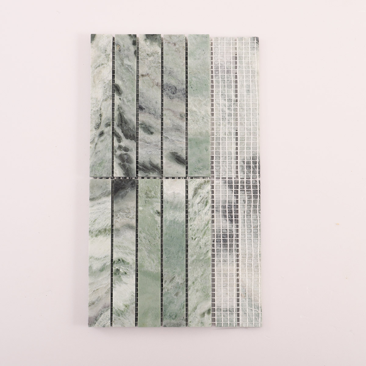 Folded back side of emerald green marble polished vertical mosaic tiles