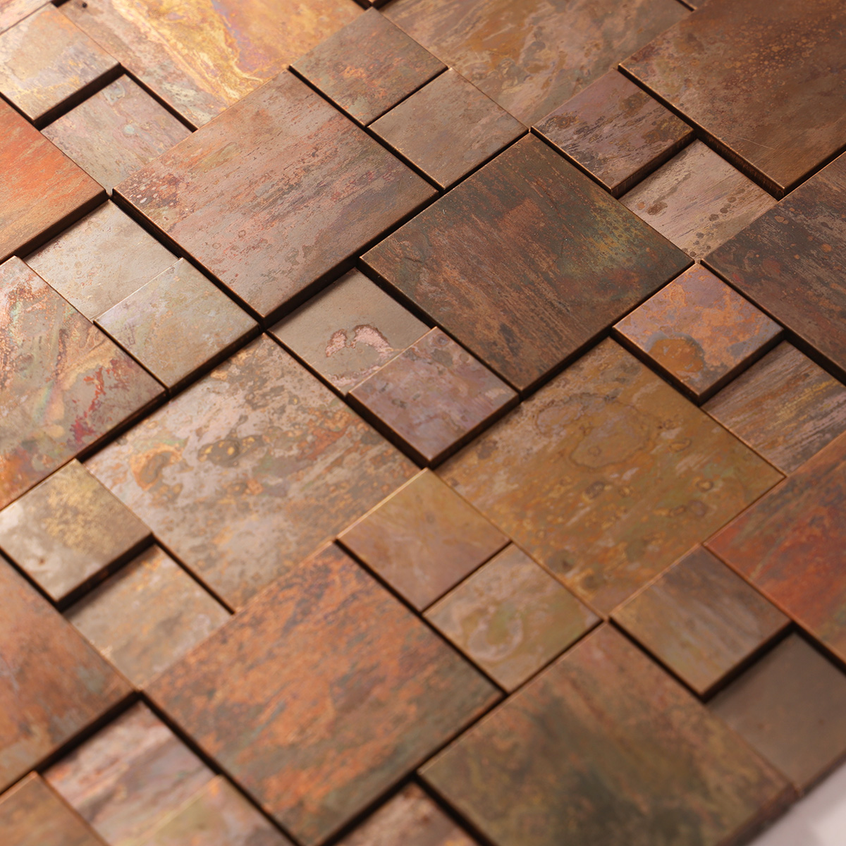 Close-up view of 3D copper metallic mosaic tile.