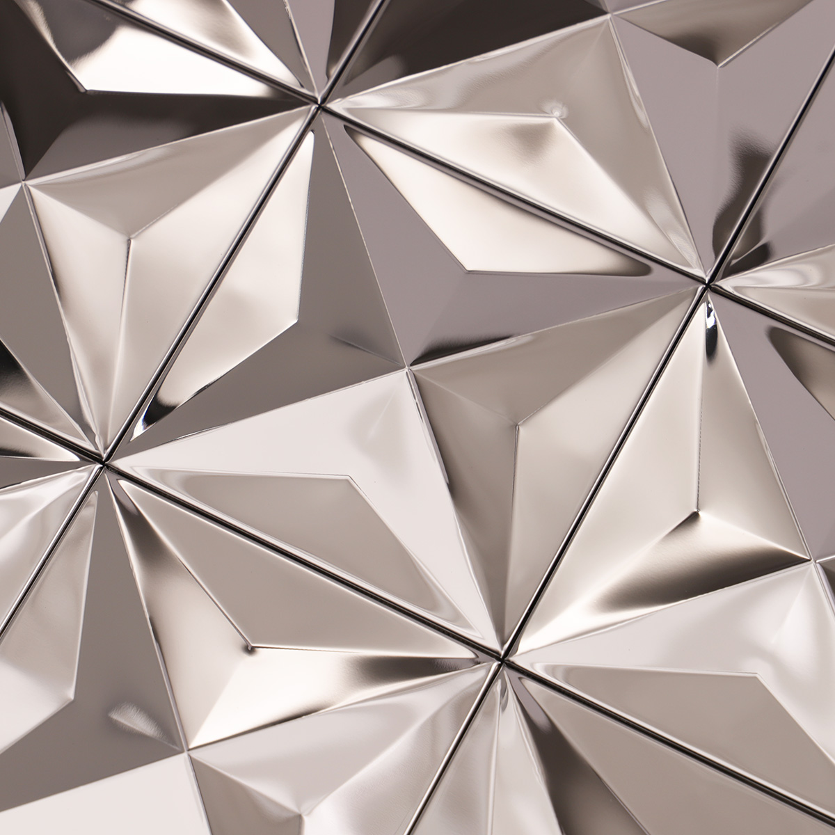 Detailed close-up of 3D silver mirror stainless steel square metal mosaic tiles.