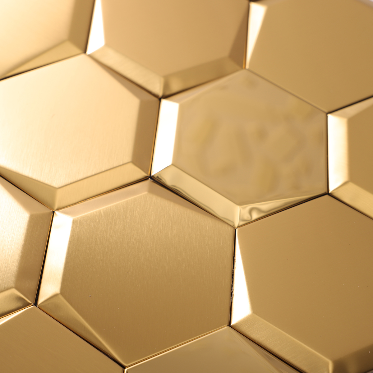 Close-up of mirror hexagon gold stainless steel mosaic tiles.