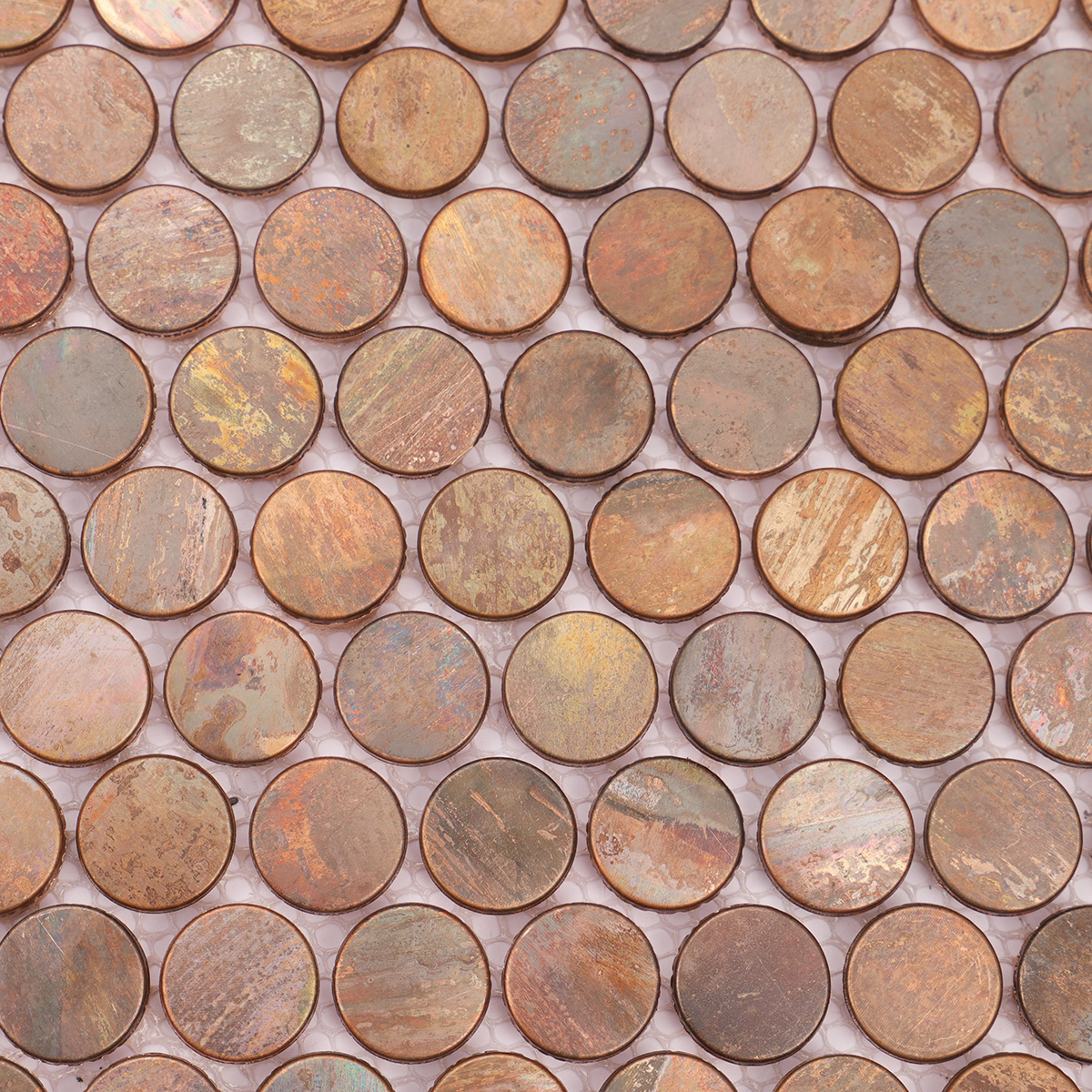 Close-up view of penny rounds copper mosaic tiles.