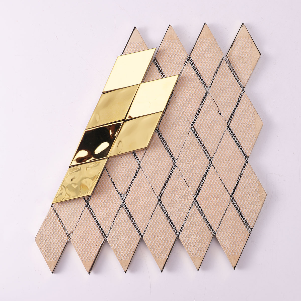 Back side of gold diamond 3D stainless steel metal mosaic wall tiles, folded.