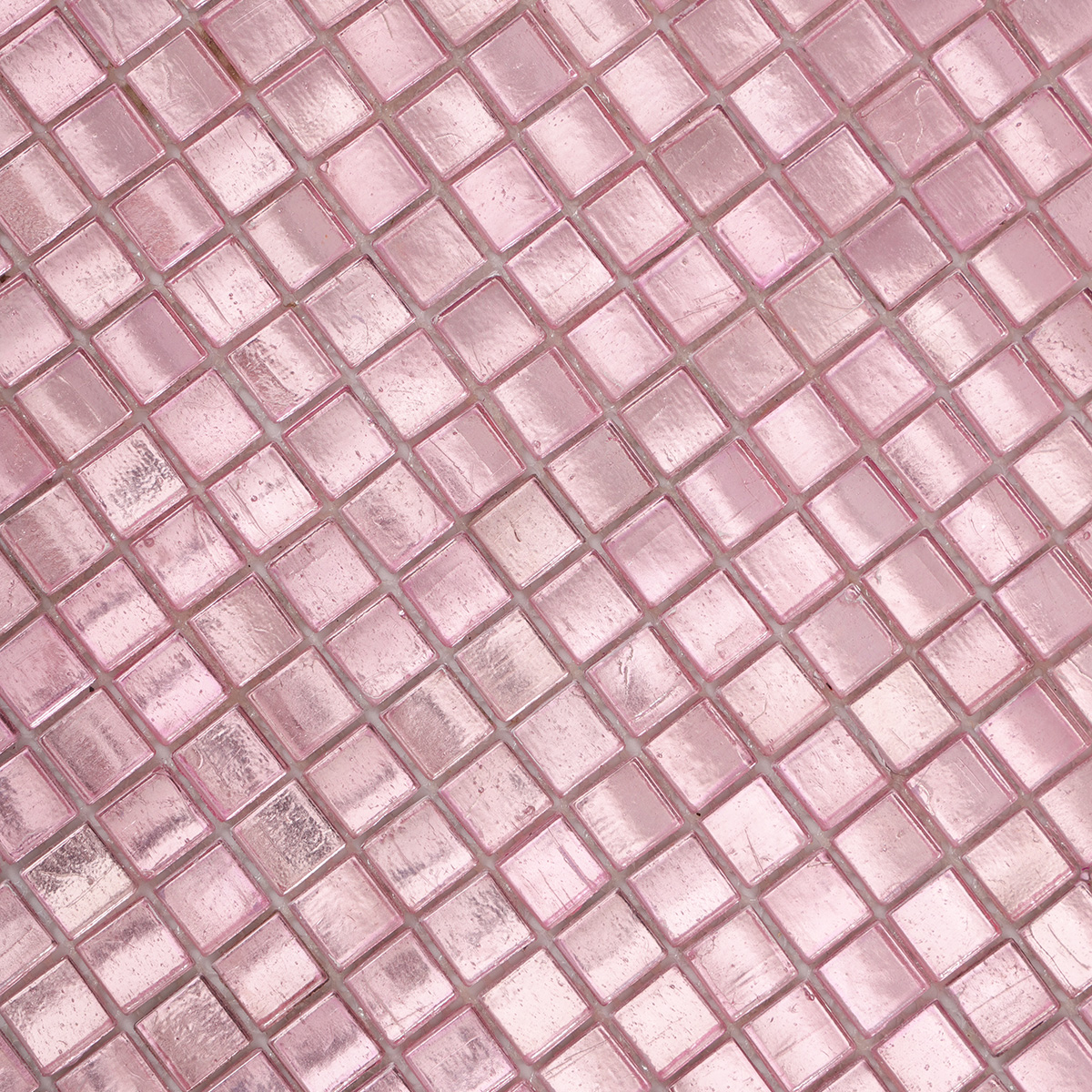 Close-up view of pink metallic foil glass mosaic tiles.