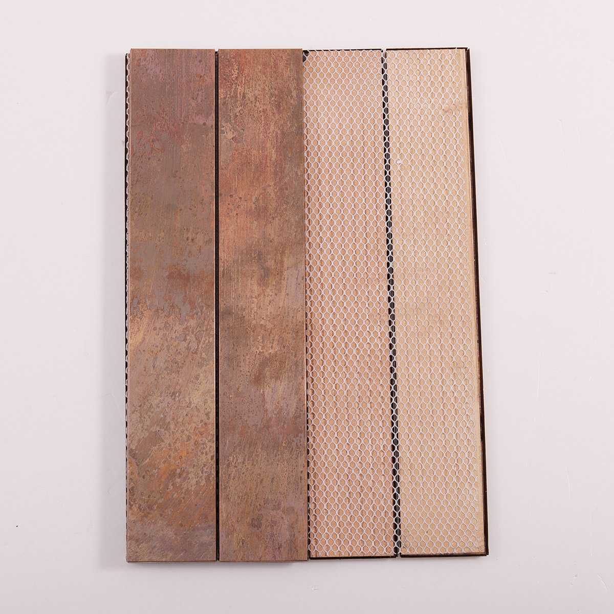 Folded back side of copper rust matte brick metal mosaic tiles