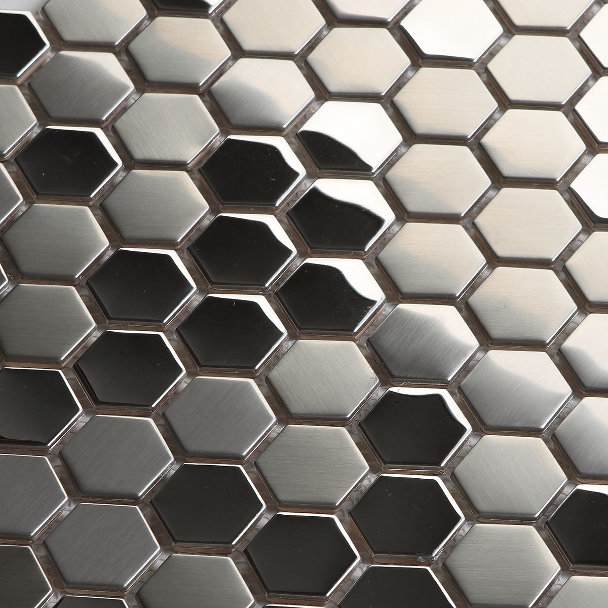 Close-up of silver hexagon stainless steel mosaic tiles.