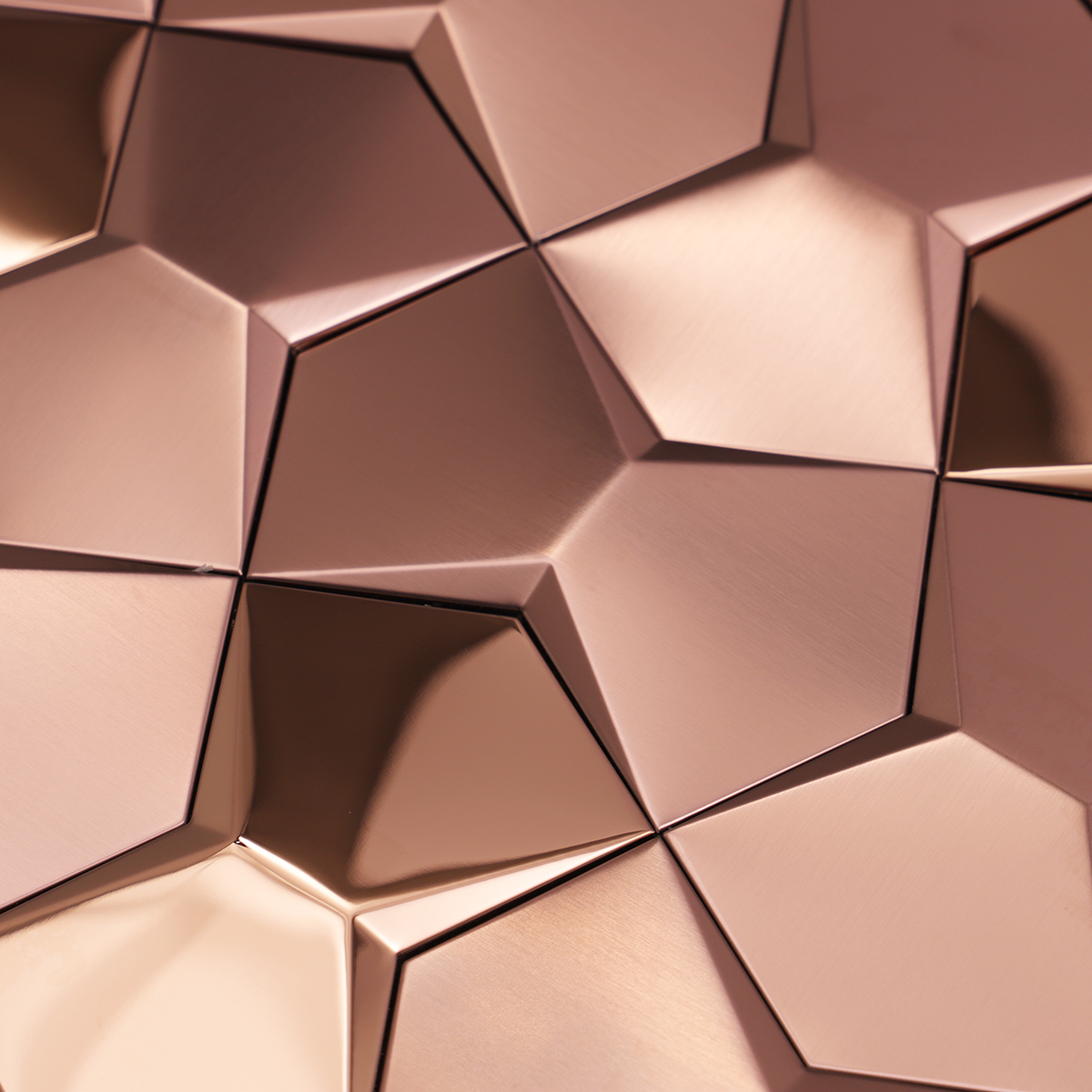 Detailed close-up of rose gold 3D metal mosaic tiles