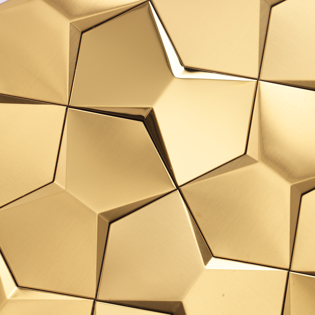 Detailed close-up of rose gold 3D stainless steel hexagon mosaic tiles.