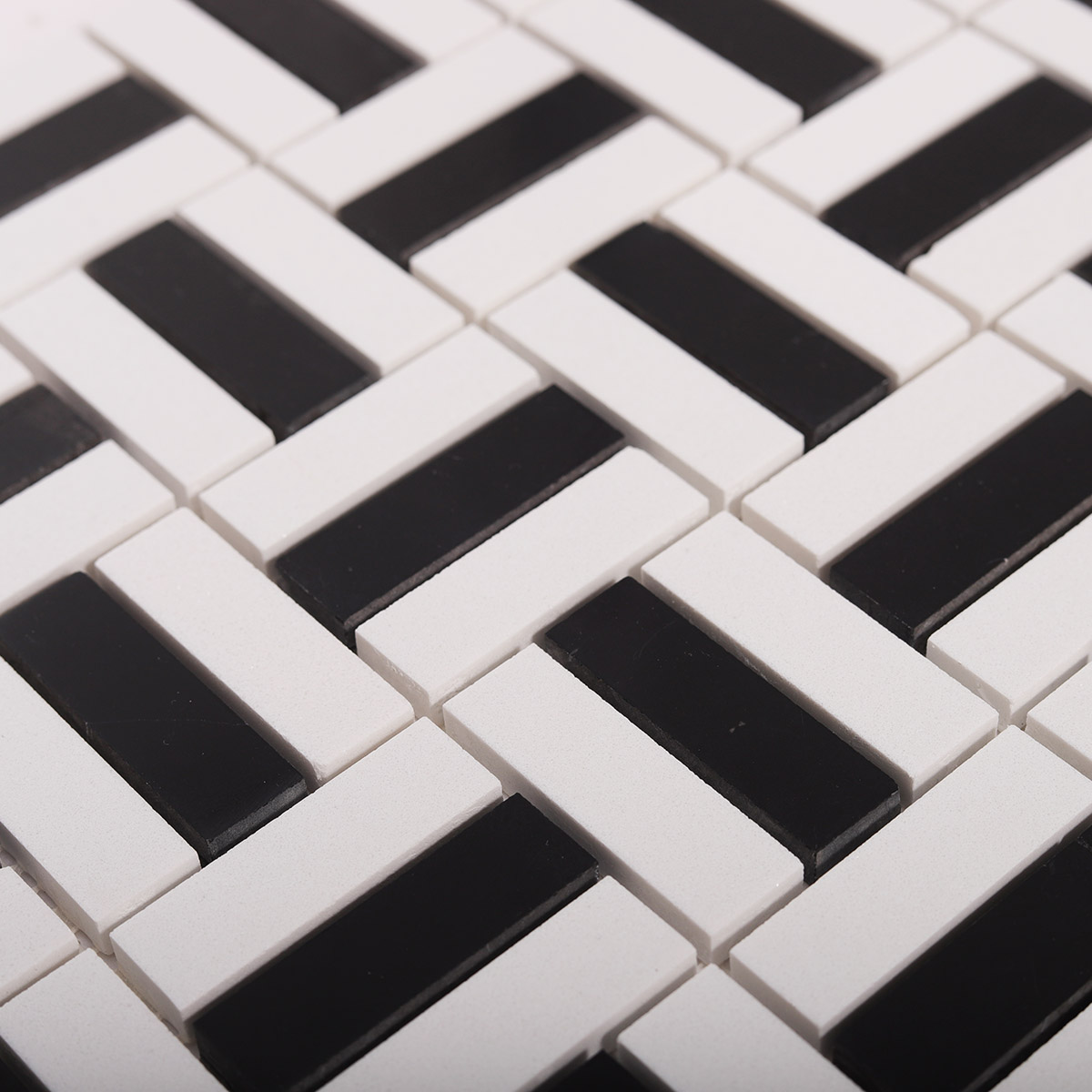 Close-up view of black and white faux marble mosaic tiles
