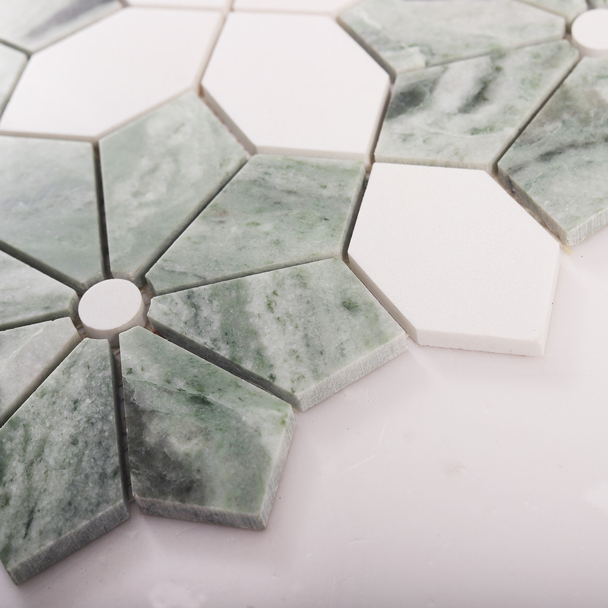 Side detail view of Ming green and white floral marble mosaic tiles