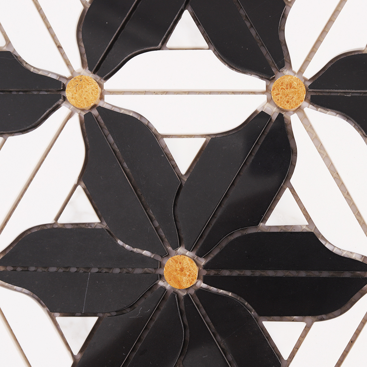 Close-up of black and white flower marble mosaic tiles.