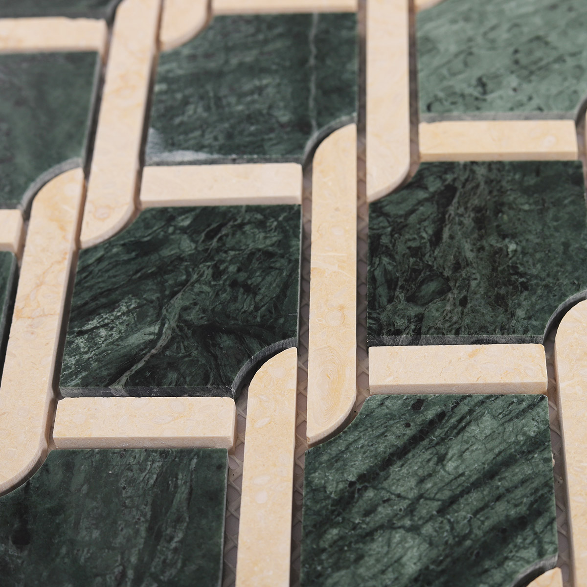 Detailed close-up of Rockart Medallion Green polished marble mosaic tiles
