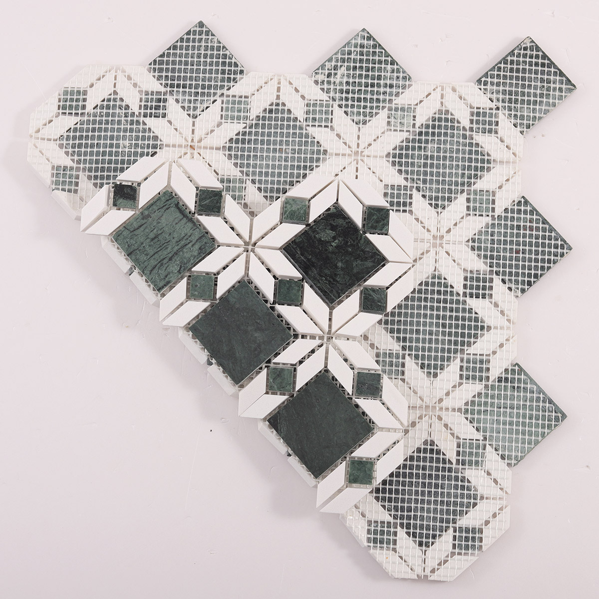Folded back side of Green and White Natural Marble Flower mosaic tiles