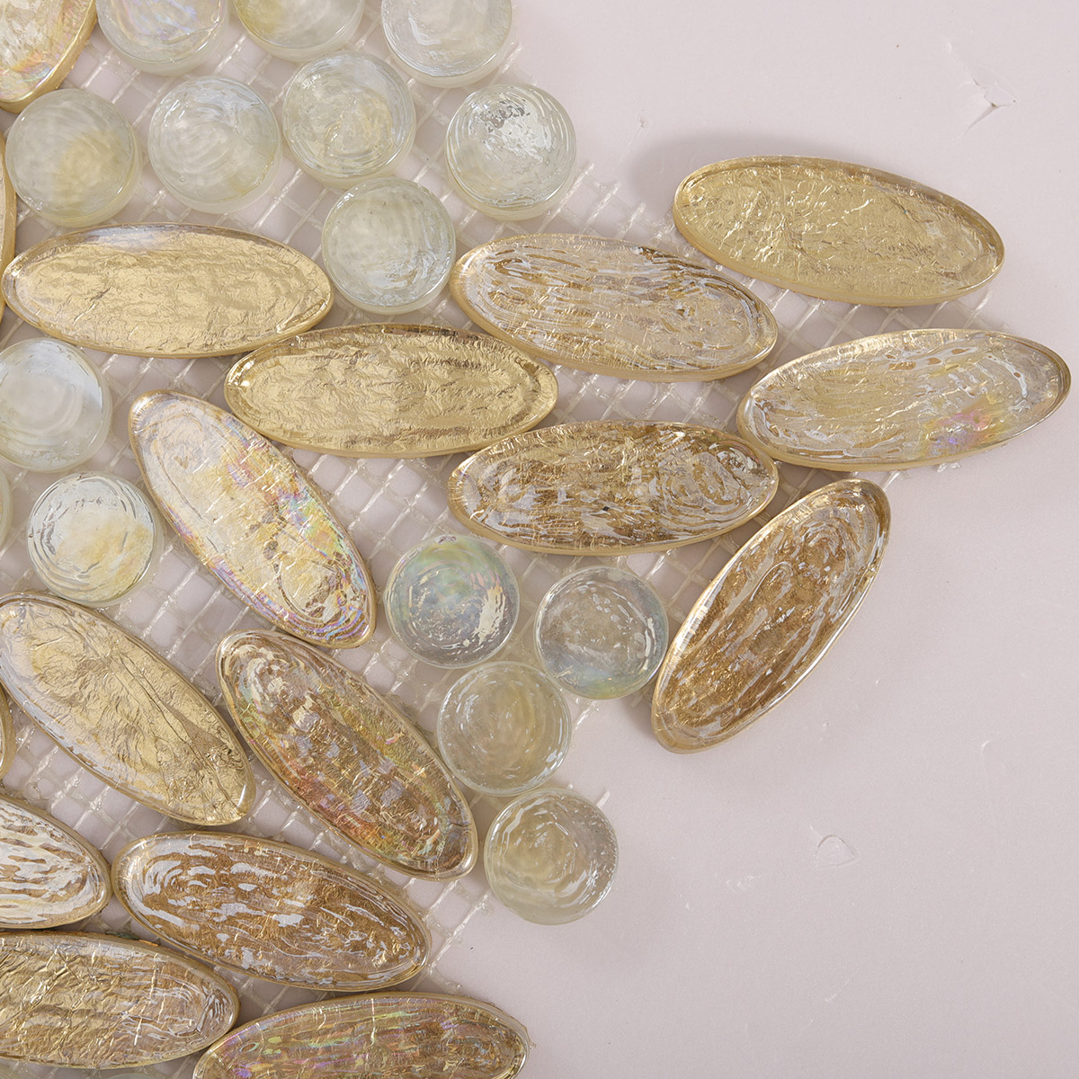 Close-up of Gold Glass Flower Art Mosaic Floor Tiles.