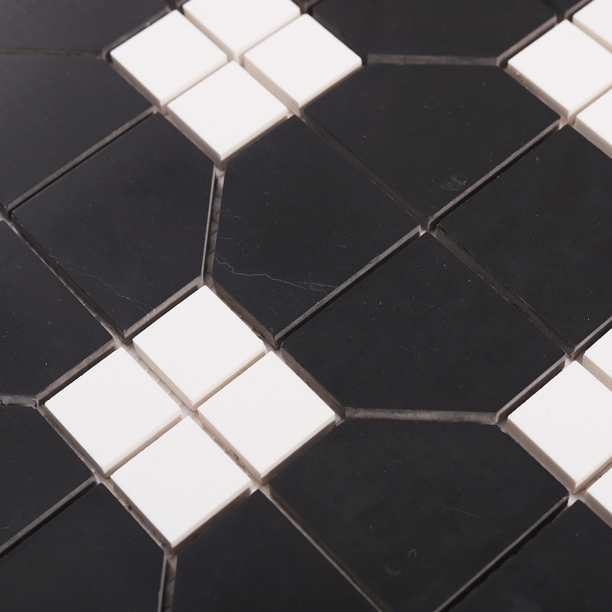 Detailed close-up of Black and White Hexagon Geometric Marble Mosaic Tiles.