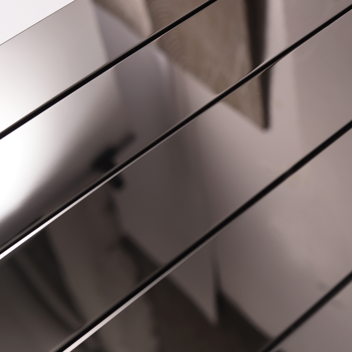 Close-up of Black Glossy Stainless Steel Brick Mosaic Tile, texture detail
