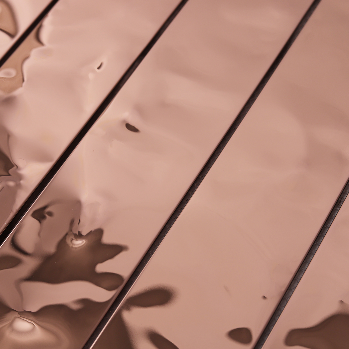 Close-up of Rose Gold Stainless Steel Brick Mosaic Tiles, texture detail