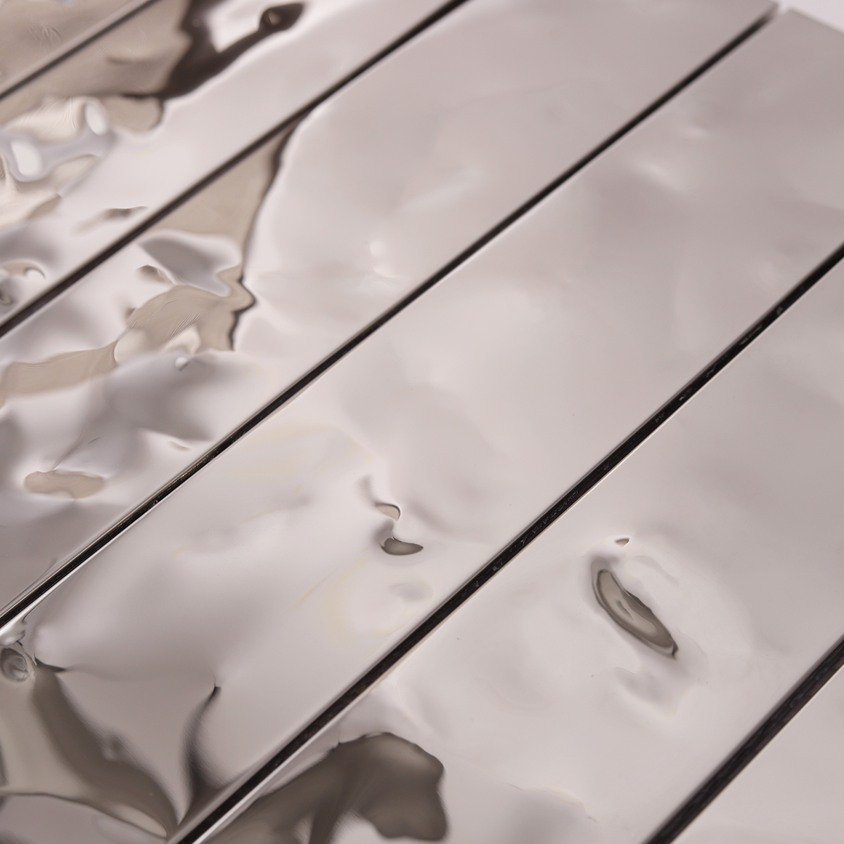 Close-up of Silver Stainless Steel Stacked Mosaic Tiles, texture detail