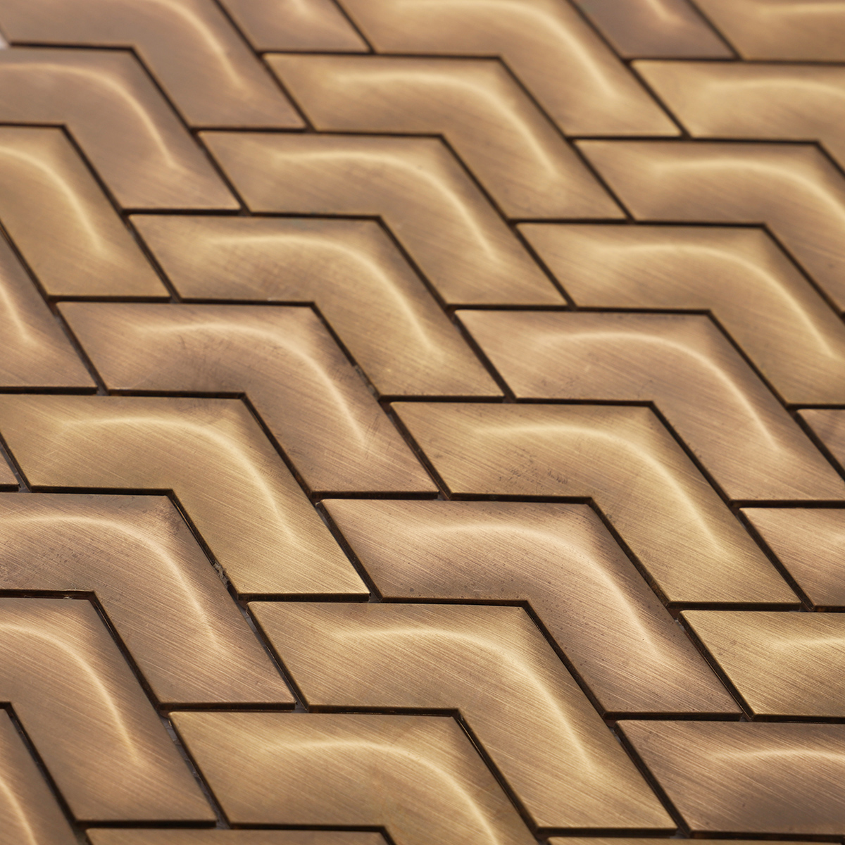 Detailed view of Chevron Brass Metal Mosaic Wall Tile, chevron pattern and glossy finish