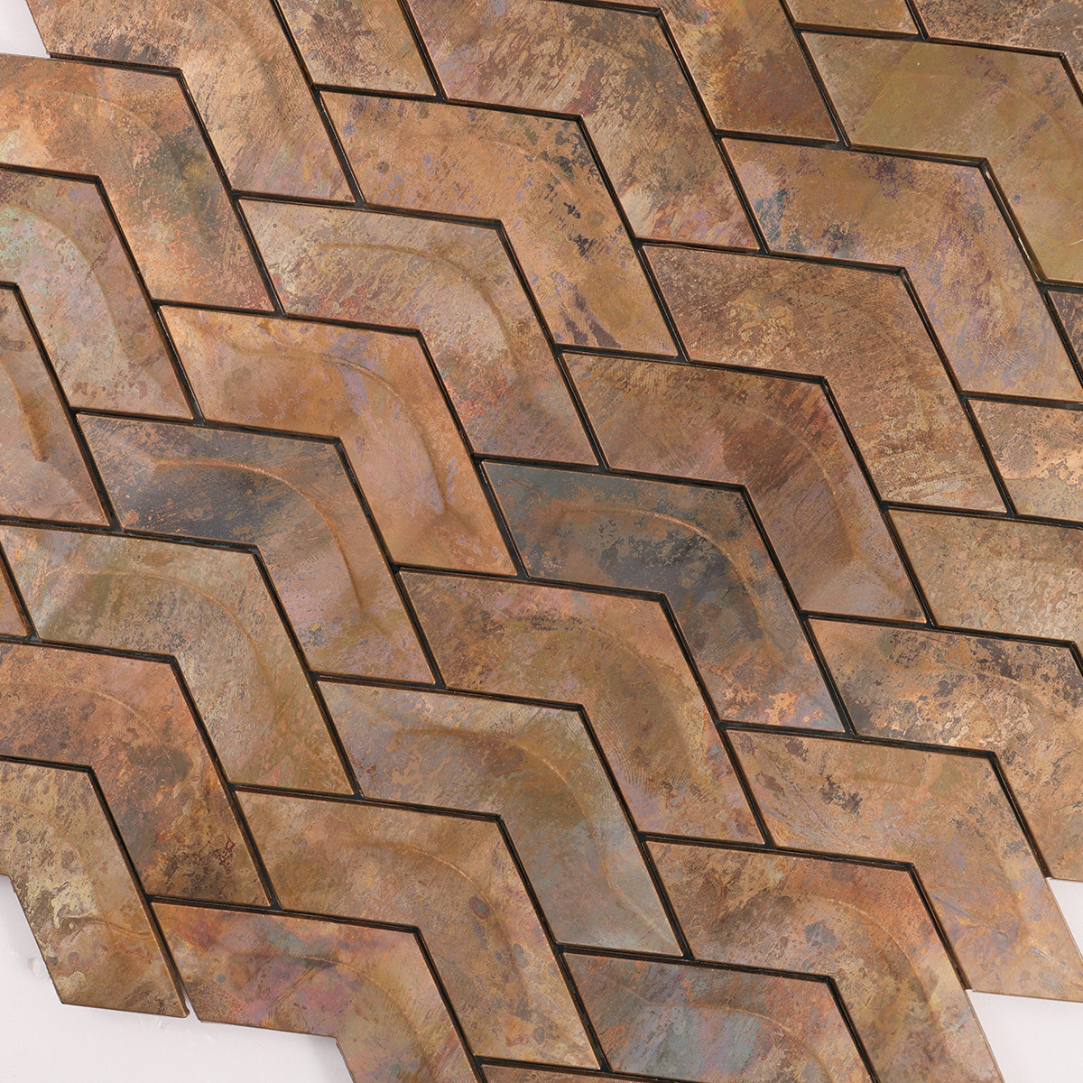 Close-up of Herringbone Copper 3D Wave Metal Mosaic Tile Pattern