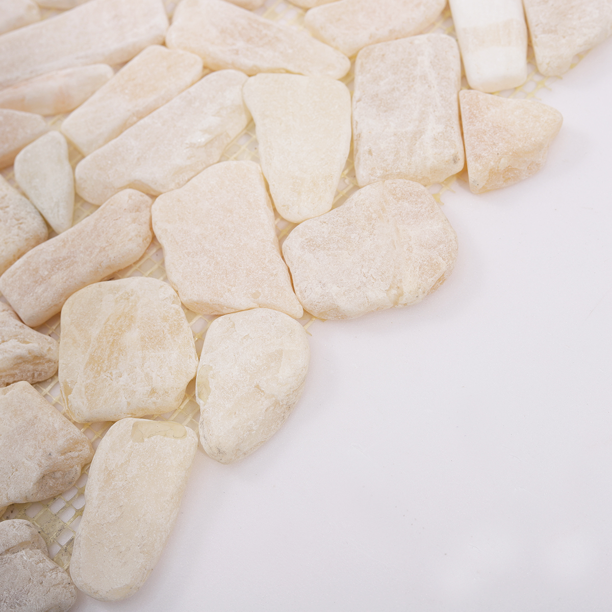 Side View Showing Thickness of Beige Shaved Pebble Travertine Mosaic Tile