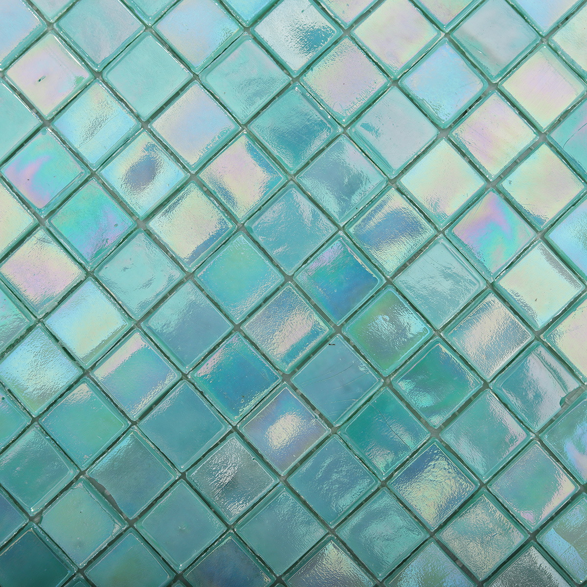 Close-up of Iridescent Blue Green Glass Mosaic Tile Surface