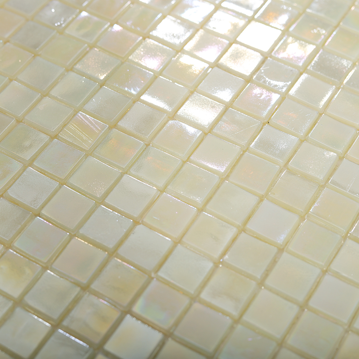 Detailed View of Cream Glass Tile Backsplash with Glossy Finish