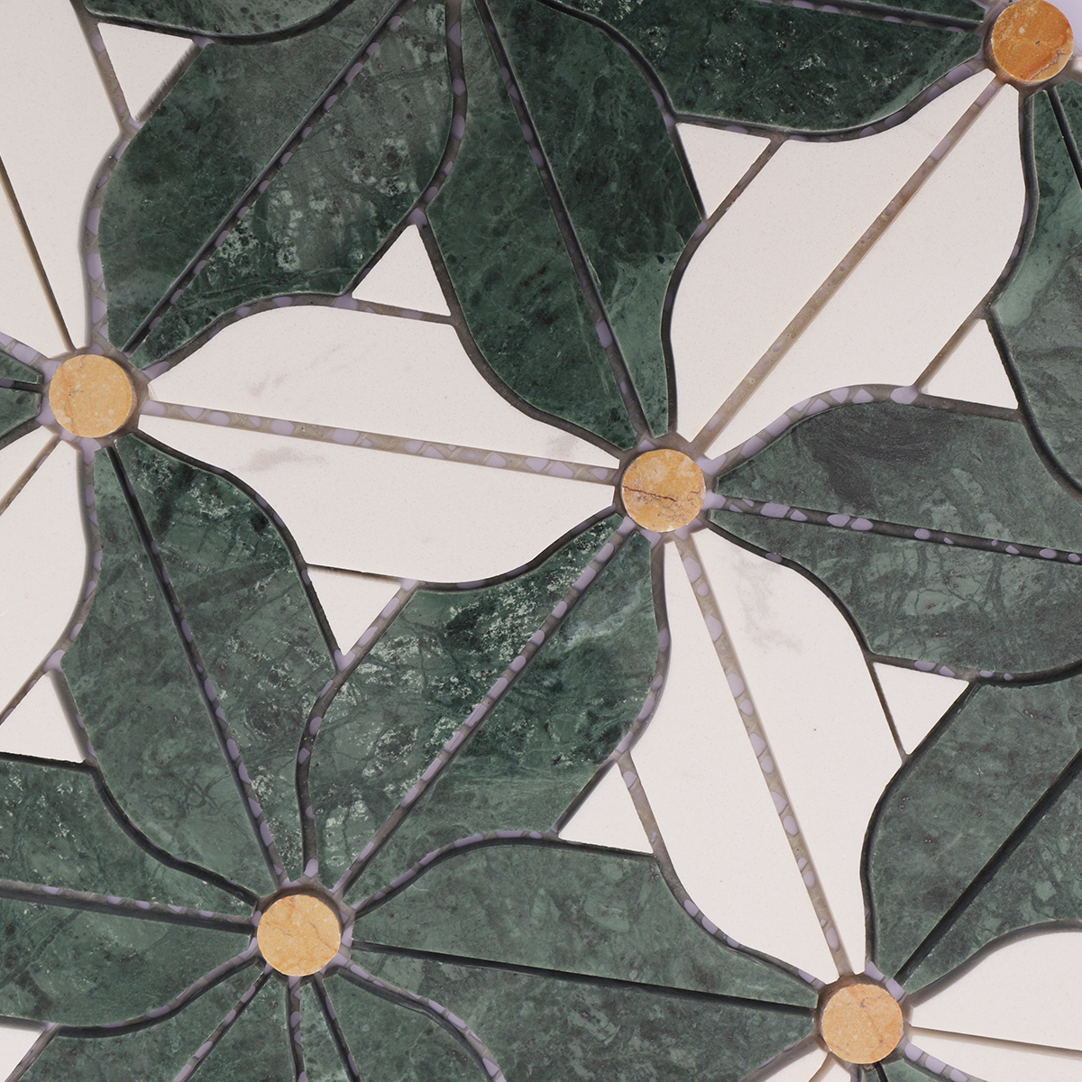 Close-up of the detailed design and texture of the  marble flower mosaic tiles