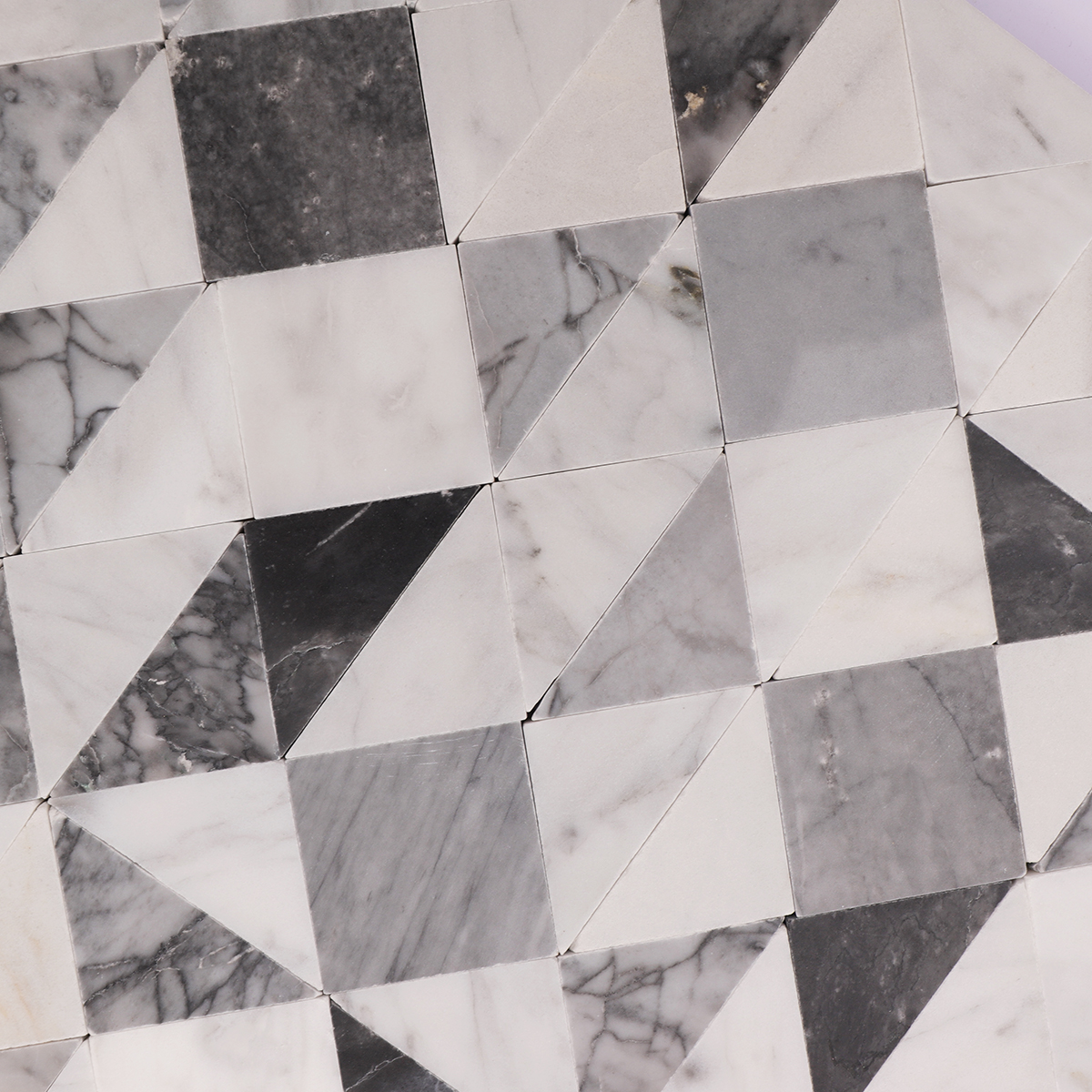  Detailed view highlighting the clean lines and polished surface of the  mosaic.