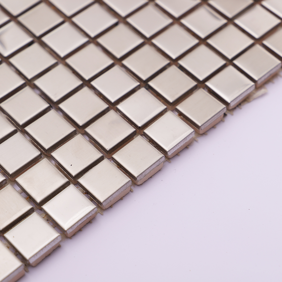 Side profile showcasing the thickness of the stainless steel mosaic tiles