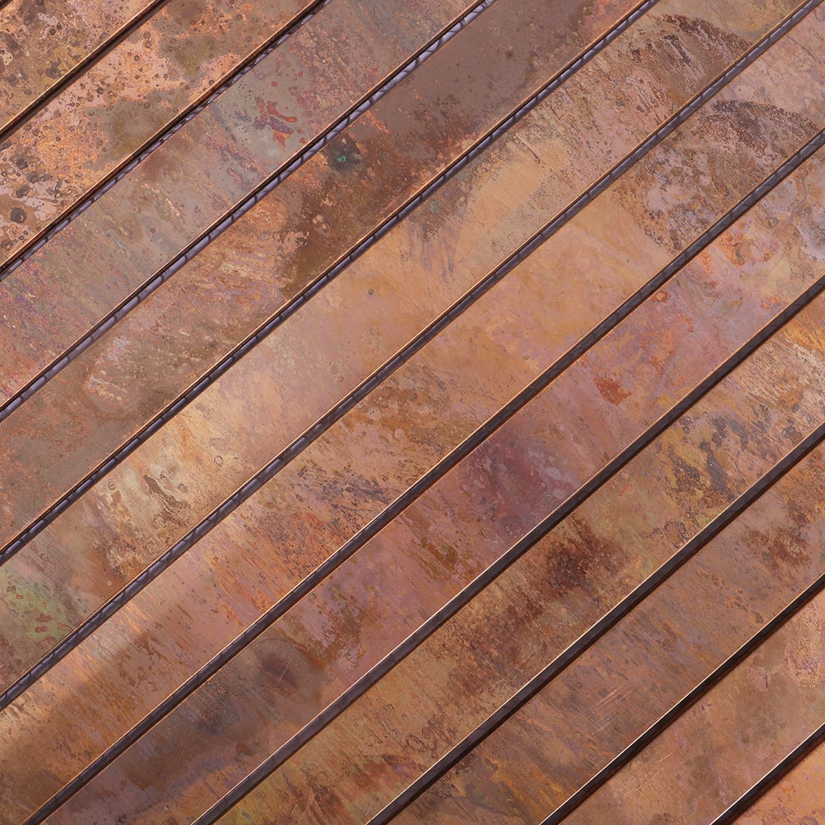 Vintage copper mosaic tile sheet diagonal surface view