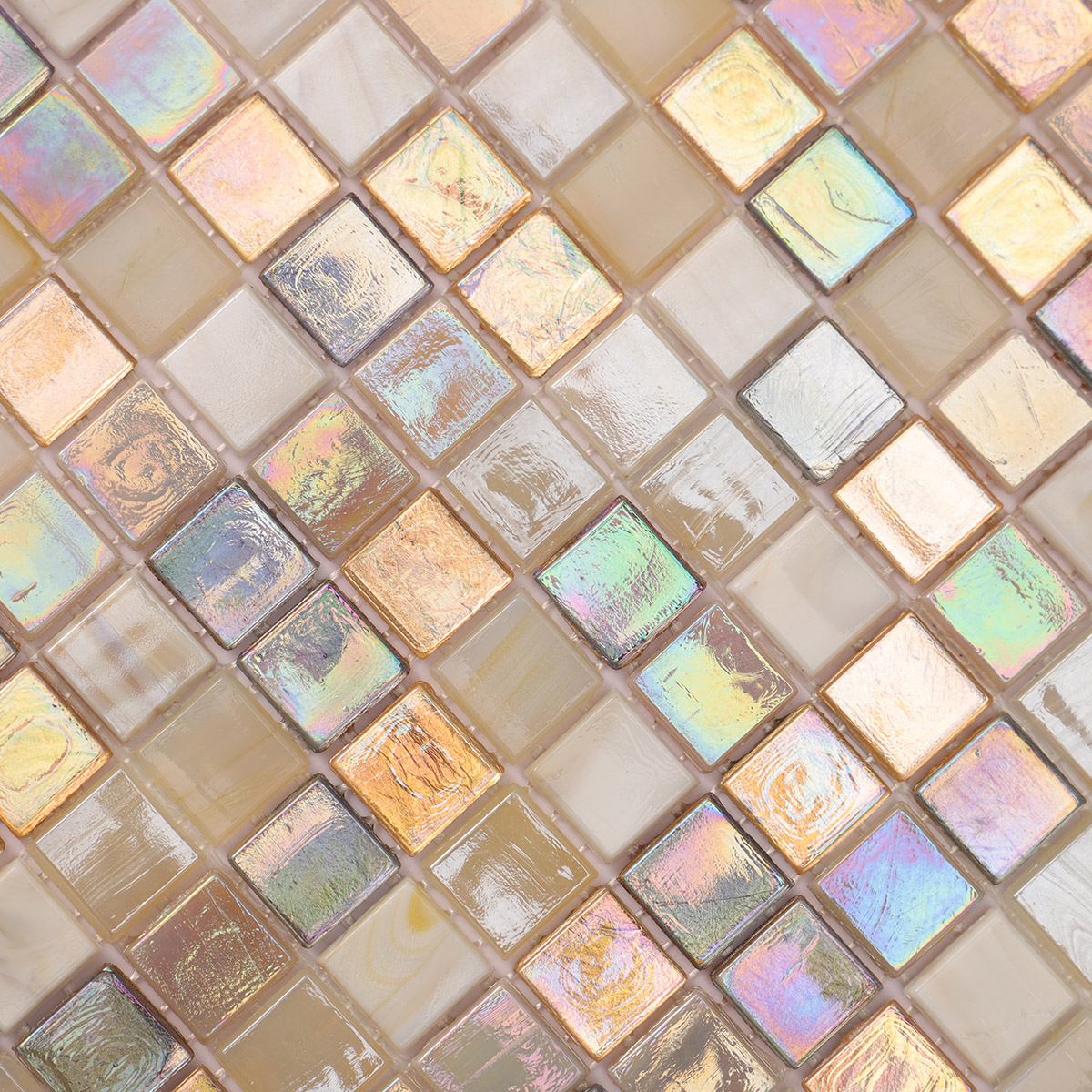 Close-up of beige and gold iridescent glass mosaic tiles mixed.