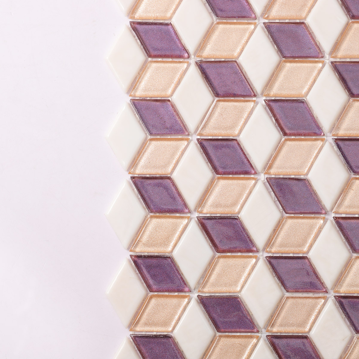 Close-up of pink and purple diamond-shaped glass mosaic tiles