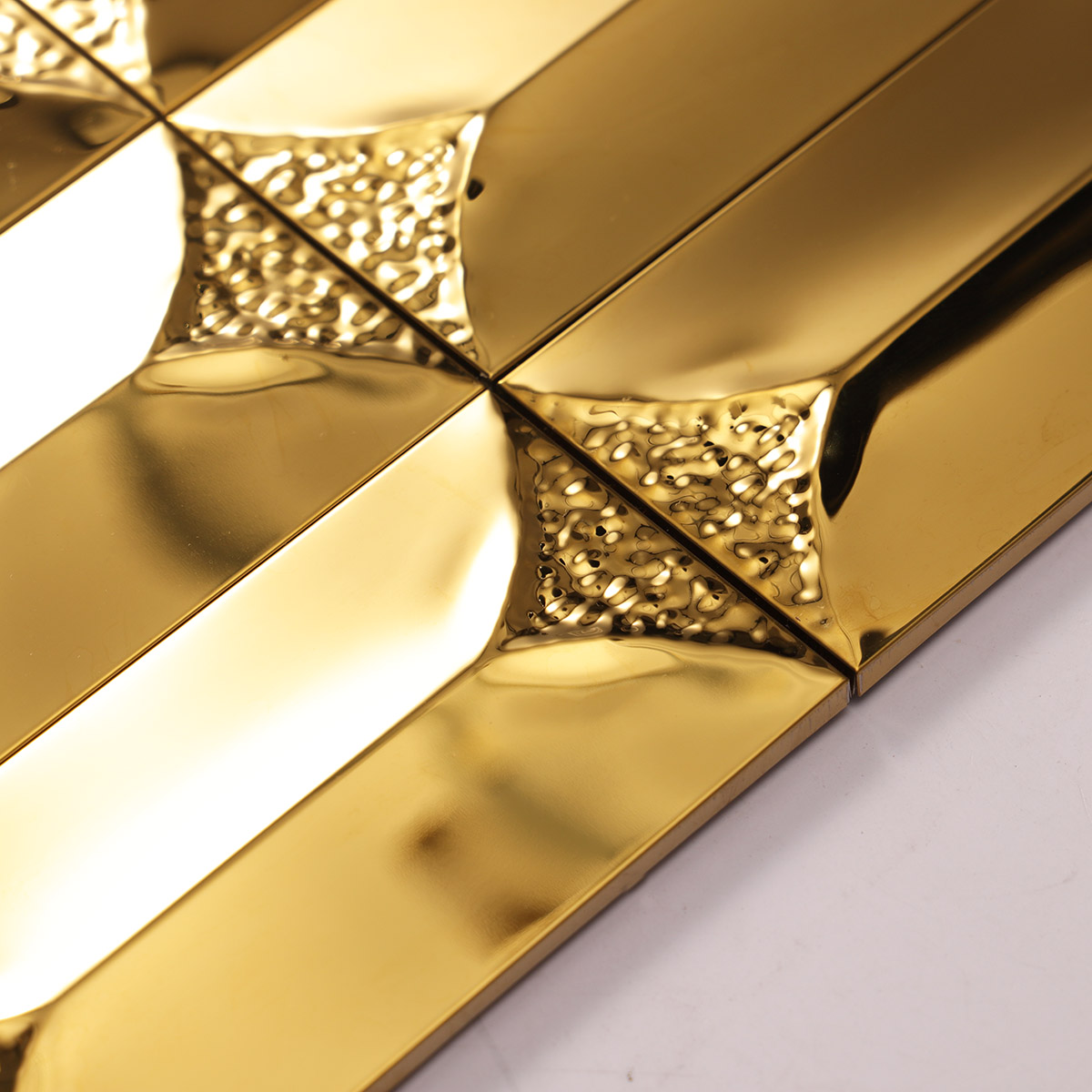 Third close-up of gold rectangle 3D metal mosaic tile