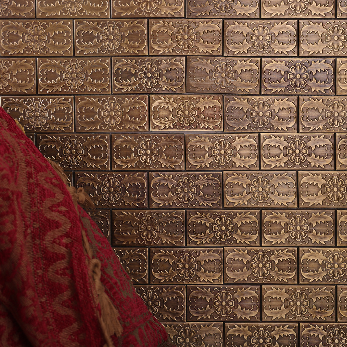 Copper subway mosaic with decorative patterns, white floor tiles, and curtain