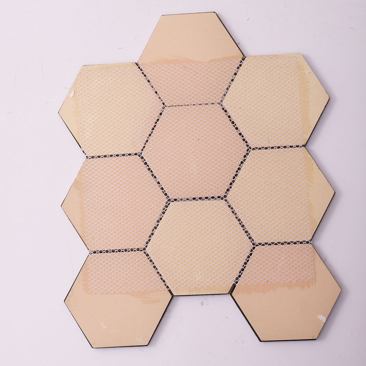 Back side of 3D black and gold hexagon metal mosaic, 