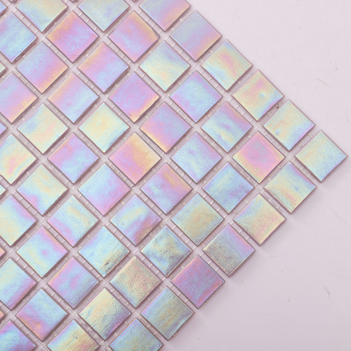 Close-up of the side of purple iridescent square glass mosaic tiles