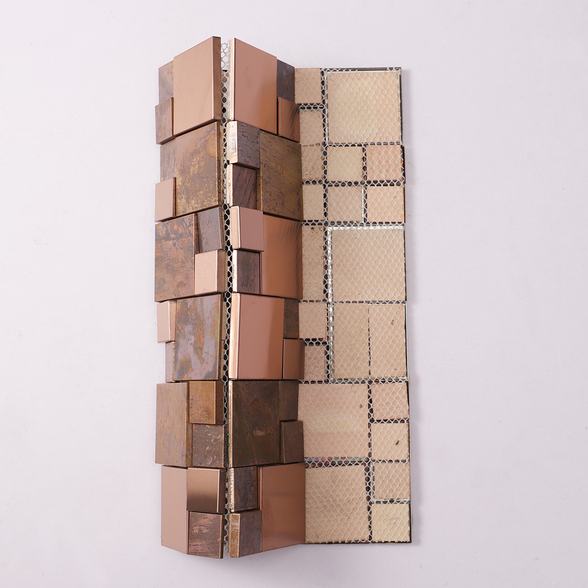 Folded back side of 3D copper and stainless steel tiles