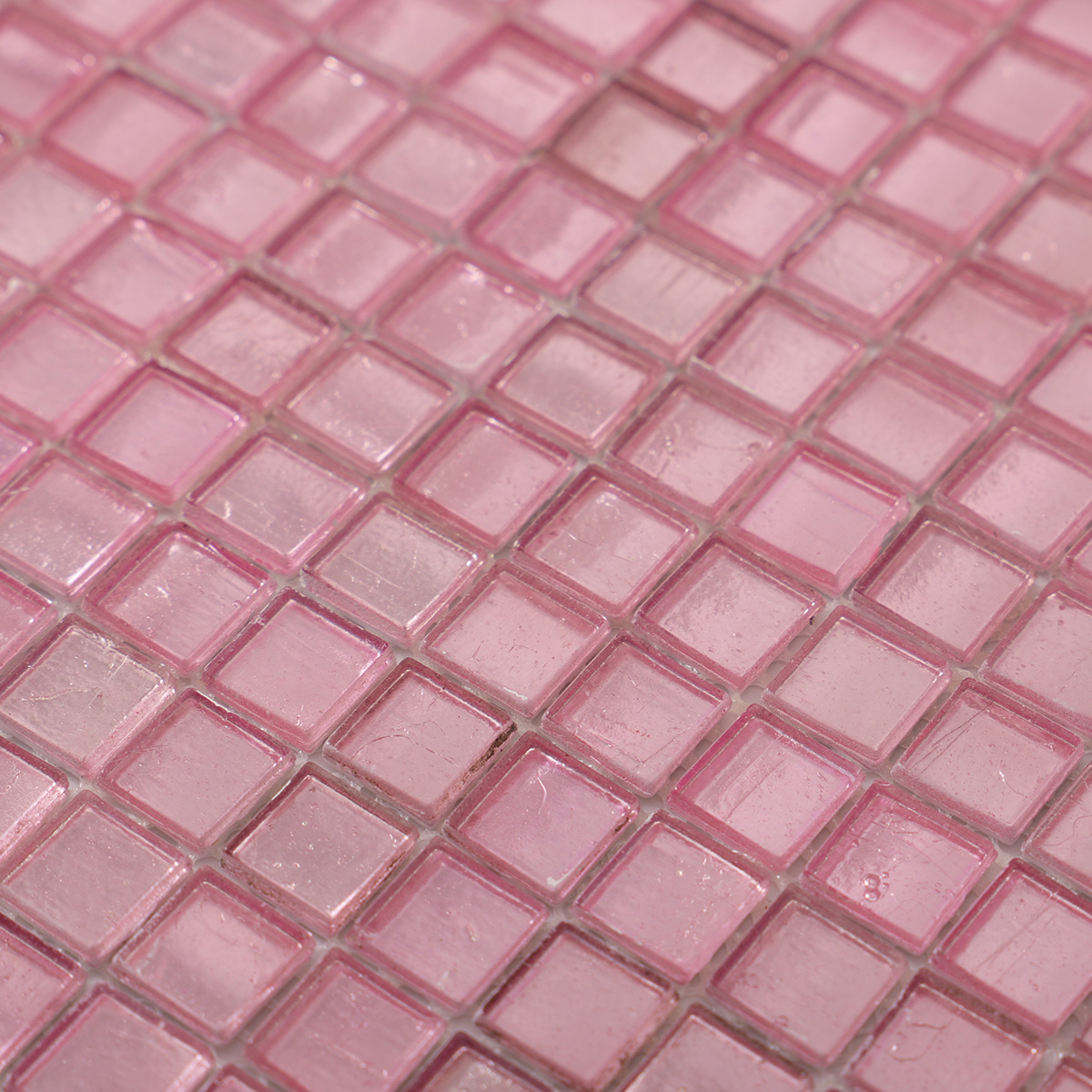 Close-up of pink metallic foil glass mosaic tiles
