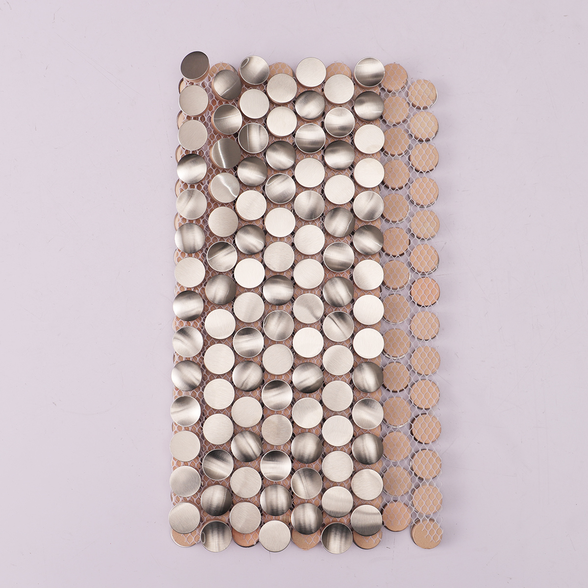 Rear folded view of 3D penny round silver stainless steel mosaic tiles.